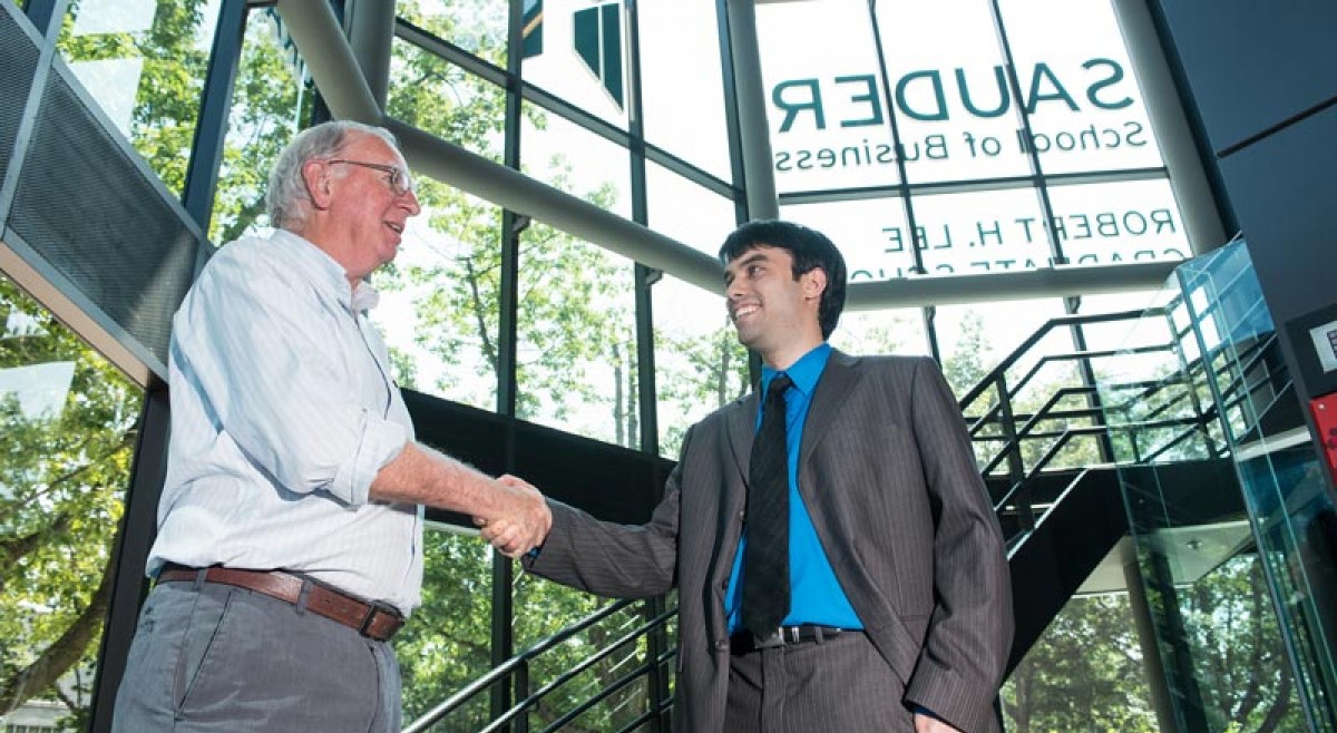 2 men shaking hands